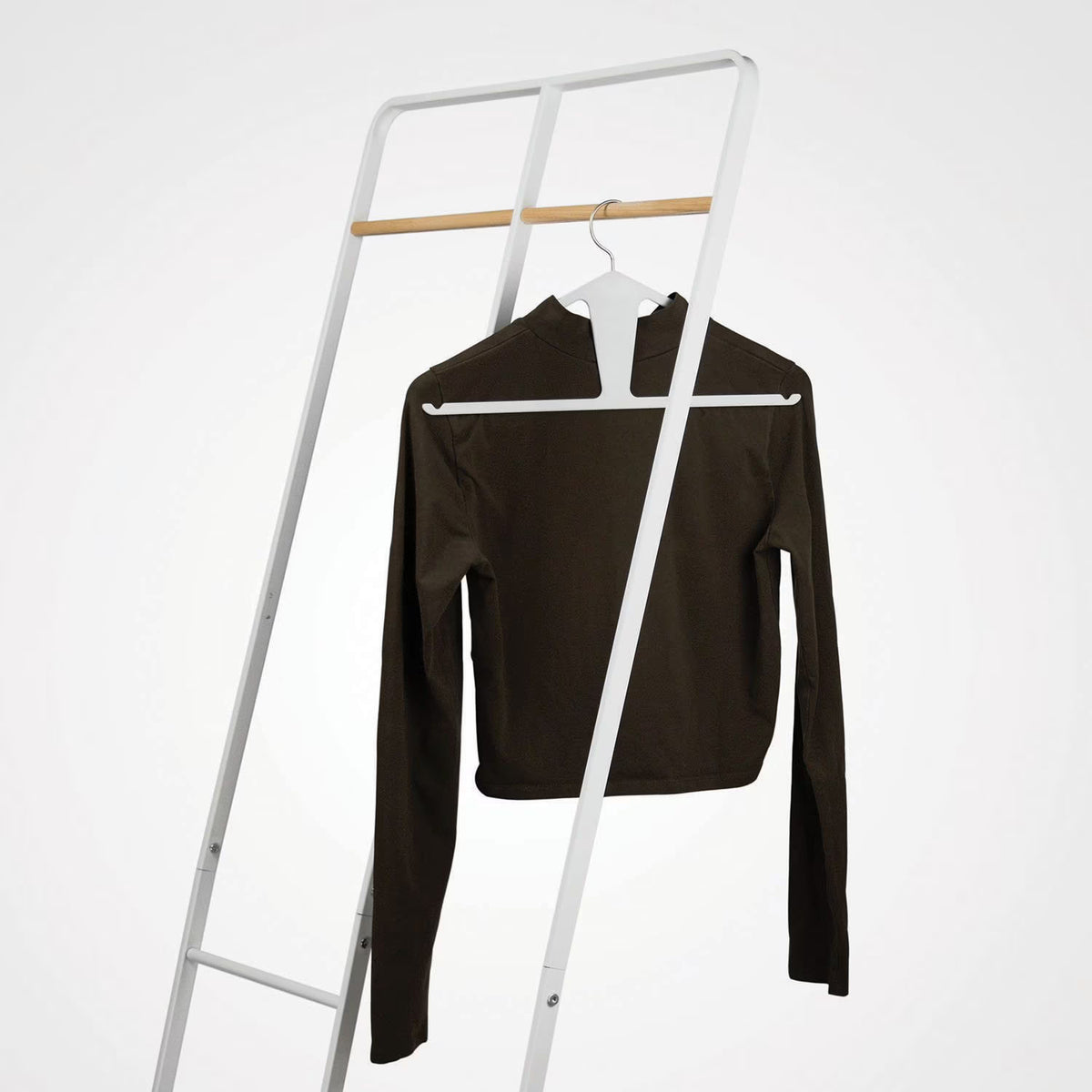 The Slim Kangaroo™ Hanger 40-Pack - Made in Wisconsin, USA with 100% recycled material - The patented design clips in pants, shirts, straps, tanks, jackets and even entire outfits on a single hanger